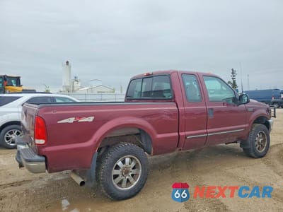 Trzecie zdjęcie samochodu z tyłu: 1999 FORD F250 SUPER DUTY VIN:1FTNX21L5XEE92141 - miniatura
