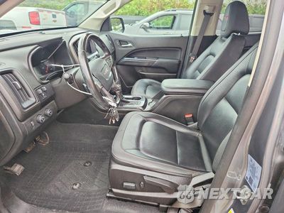 Zdjęcie 7 z 12 samochodu: 2021 GMC CANYON AT4 VIN:1GTG6FEN5M1124379 - miniatura
