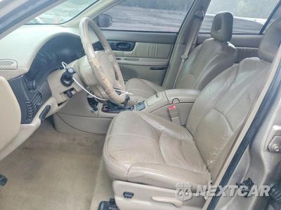 Zdjęcie 7 z 13 samochodu: 1999 BUICK REGAL LS VIN:2G4WB52K4X1460093 - miniatura