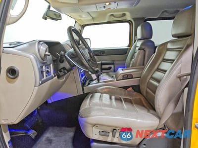 Zdjęcie 7 z 13 samochodu: 2003 HUMMER H2 VIN:5GRGN23U13H146938 - miniatura
