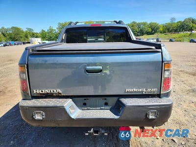 Zdjęcie 6 z 12 samochodu: 2006 HONDA RIDGELINE RTL VIN:2HJYK16536H565591 - miniatura