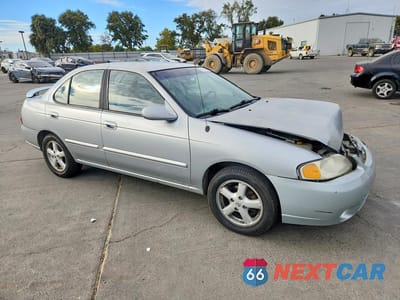 Czwarte zdjęcie samochodu z boku: 2002 NISSAN SENTRA GXE VIN:3N1CB51A52L551142 - miniatura