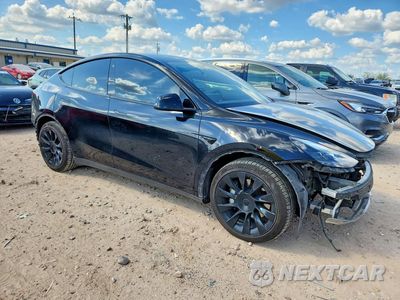 Czwarte zdjęcie samochodu z boku: 2021 TESLA MODEL Y VIN:5YJYGDEE2MF265472 - miniatura