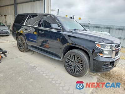 Czwarte zdjęcie samochodu z boku: 2020 CHEVROLET TAHOE POLICE VIN:1GNLCDEC1LR177579 - miniatura