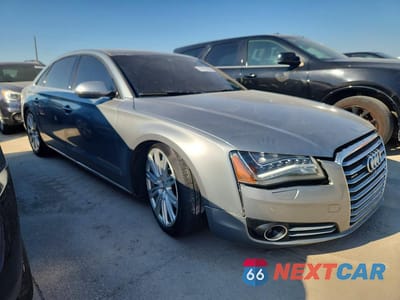 Czwarte zdjęcie samochodu z boku: 2014 AUDI A8 L QUATTRO VIN:WAURGAFD6EN003768 - miniatura