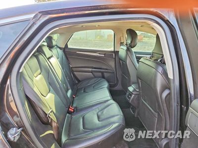 Zdjęcie 10 z 12 samochodu: 2013 FORD FUSION TITANIUM VIN:3FA6P0K9XDR155054 - miniatura
