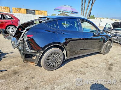 Trzecie zdjęcie samochodu z tyłu: 2023 TESLA MODEL Y VIN:7SAYGDEE7PF944628 - miniatura