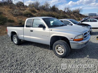 Czwarte zdjęcie samochodu z boku: 1999 DODGE DAKOTA VIN:1B7GG22Y4XS227313 - miniatura