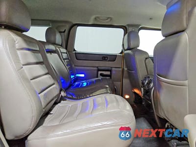 Zdjęcie 11 z 13 samochodu: 2003 HUMMER H2 VIN:5GRGN23U13H146938 - miniatura