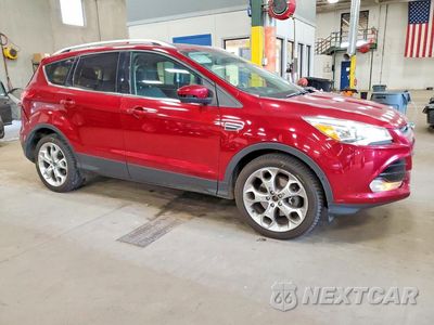Czwarte zdjęcie samochodu z boku: 2014 FORD ESCAPE TITANIUM VIN:1FMCU9J96EUA88745 - miniatura