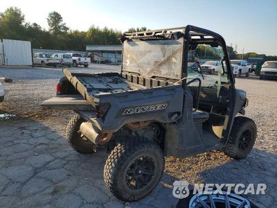 Czwarte zdjęcie samochodu z boku: 2023 POLARIS RANGER 1000 UTILITY VEHICLE VIN:3NSTAA99XPH360280 - miniatura
