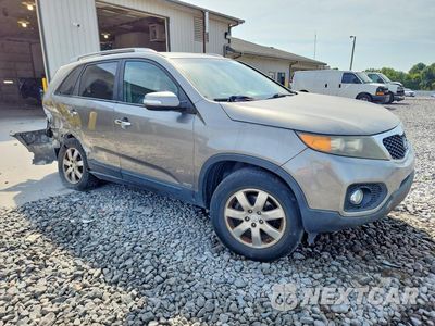 Czwarte zdjęcie samochodu z boku: 2011 KIA SORENTO LX VIN:5XYKTCA12BG144042 - miniatura