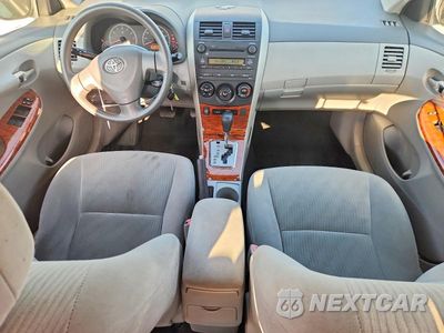 Zdjęcie 8 z 12 samochodu: 2009 TOYOTA COROLLA XLE VIN:1NXBU40E09Z035607 - miniatura