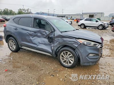 Czwarte zdjęcie samochodu z boku: 2017 HYUNDAI TUCSON SE VIN:KM8J33A44HU595241 - miniatura