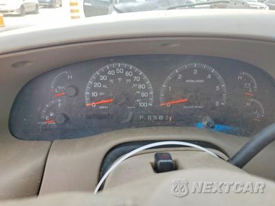 Zdjęcie 9 z 12 samochodu: 2003 FORD F150 SUPERCREW VIN:1FTRW08L83KC30303 - miniatura