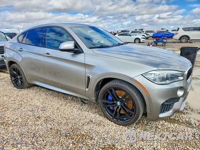 Czwarte zdjęcie samochodu z boku: 2016 BMW X6 M VIN:5YMKW8C57G0R43842 - miniatura