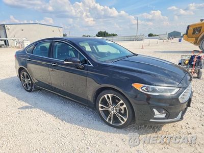 Czwarte zdjęcie samochodu z boku: 2020 FORD FUSION TITANIUM VIN:3FA6P0D9XLR153204 - miniatura