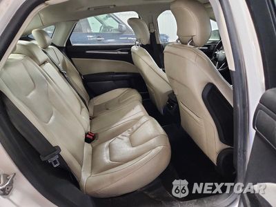 Zdjęcie 10 z 12 samochodu: 2014 FORD FUSION TITANIUM HEV VIN:3FA6P0RU6ER393284 - miniatura
