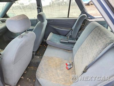 Zdjęcie 10 z 12 samochodu: 1999 FORD ESCORT SE VIN:3FAFP15P6XR160322 - miniatura