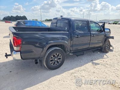 Trzecie zdjęcie samochodu z tyłu: 2022 TOYOTA TACOMA SR5 V6 VIN:3TMAZ5CN6NM176098 - miniatura