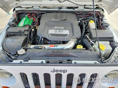 Zdjęcie 12 z 13 samochodu: 2012 JEEP WRANGLER UNLIMITED SPORT VIN:1C4BJWDG4CL282887 - miniatura