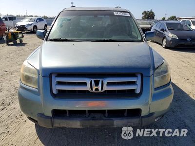 Piąte zdjęcie samochodu w środku: 2006 HONDA PILOT EX VIN:2HKYF18506H534442 - miniatura