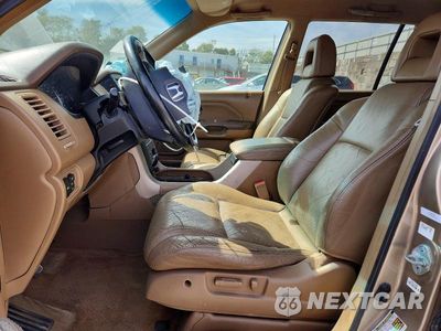 Zdjęcie 7 z 13 samochodu: 2004 HONDA PILOT EXL VIN:2HKYF18664H508482 - miniatura