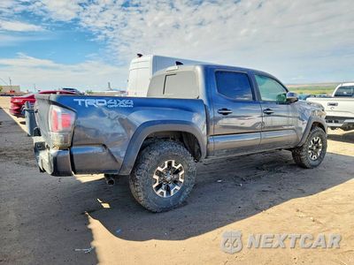 Trzecie zdjęcie samochodu z tyłu: 2023 TOYOTA TACOMA TRD OFF-ROAD VIN:3TMCZ5AN5PM591931 - miniatura