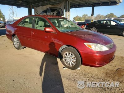 Czwarte zdjęcie samochodu z boku: 2002 TOYOTA CAMRY LE VIN:JTDBE32K020092420 - miniatura