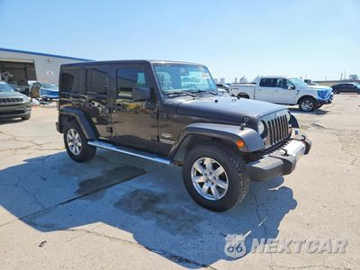 Czwarte zdjęcie samochodu z boku: 2013 JEEP WRANGLER UNLIMITED SAHARA VIN:1C4BJWEG8DL668129 - miniatura