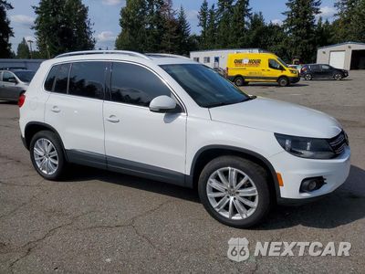 Czwarte zdjęcie samochodu z boku: 2015 VOLKSWAGEN TIGUAN S VIN:WVGBV7AX9FW563922 - miniatura