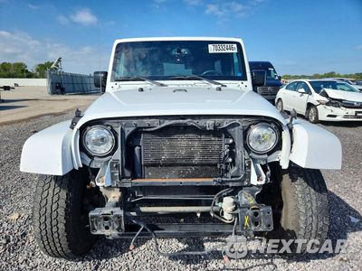 Piąte zdjęcie samochodu w środku: 2017 JEEP WRANGLER UNLIMITED SAHARA VIN:1C4BJWEG8HL735074 - miniatura