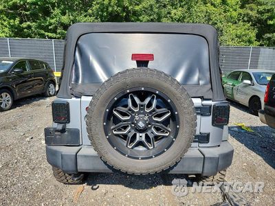 Zdjęcie 6 z 13 samochodu: 2015 JEEP WRANGLER UNLIMITED SPORT VIN:1C4BJWDG1FL771185 - miniatura