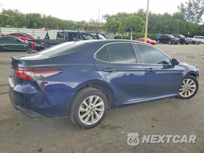 Trzecie zdjęcie samochodu z tyłu: 2021 TOYOTA CAMRY LE VIN:4T1C11AK4MU604077 - miniatura