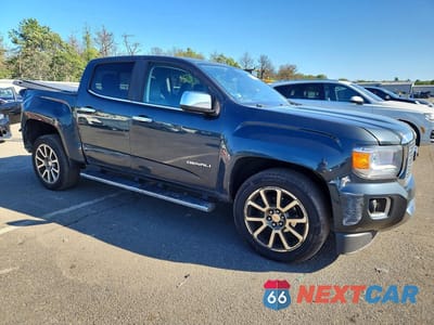 Czwarte zdjęcie samochodu z boku: 2018 GMC CANYON DENALI VIN:1GTG6EEN1J1232486 - miniatura