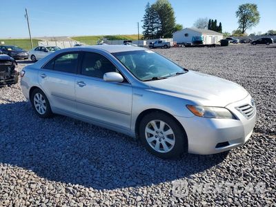 Czwarte zdjęcie samochodu z boku: 2009 TOYOTA CAMRY HYBRID VIN:4T1BB46K69U086595 - miniatura