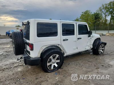 Trzecie zdjęcie samochodu z tyłu: 2015 JEEP WRANGLER UNLIMITED SAHARA VIN:1C4BJWEGXFL672878 - miniatura