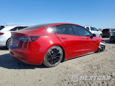 Trzecie zdjęcie samochodu z tyłu: 2018 TESLA MODEL 3 VIN:5YJ3E1EB0JF094396 - miniatura