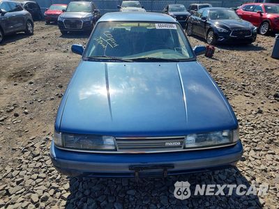 Piąte zdjęcie samochodu w środku: 1990 MAZDA 626 DX VIN:1YVGD22B7L5254965 - miniatura