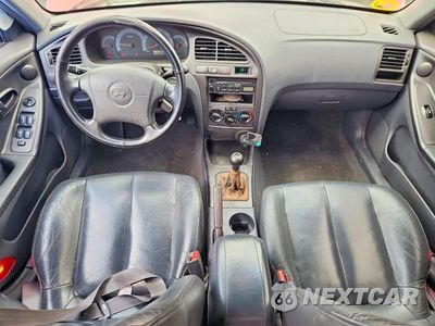 Zdjęcie 8 z 12 samochodu: 2002 HYUNDAI ELANTRA GT VIN:KMHDN55D22U052166 - miniatura