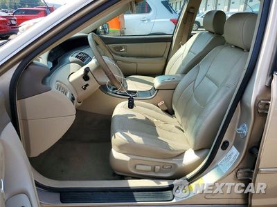 Zdjęcie 7 z 12 samochodu: 2003 TOYOTA AVALON XL VIN:4T1BF28B73U334527 - miniatura