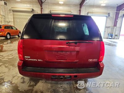 Zdjęcie 6 z 13 samochodu: 2011 GMC YUKON XL SLT VIN:1GKS2KE30BR172520 - miniatura