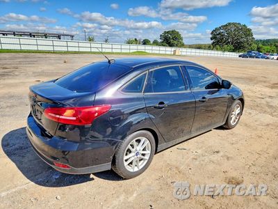Trzecie zdjęcie samochodu z tyłu: 2015 FORD FOCUS 4D VIN:1FADP3F29FL253452 - miniatura