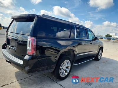 Trzecie zdjęcie samochodu z tyłu: 2017 GMC YUKON XL C1500 SLT VIN:1GKS1GKC8HR332009 - miniatura