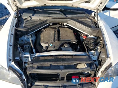 Zdjęcie 12 z 13 samochodu: 2013 BMW X5 XDRIVE35I VIN:5UXZV4C55D0B17393 - miniatura