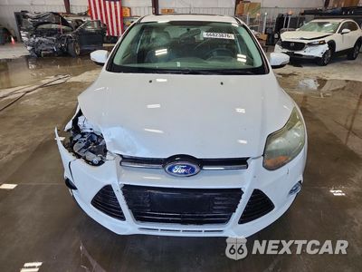 Piąte zdjęcie samochodu w środku: 2014 FORD FOCUS TITANIUM VIN:1FADP3N21EL395620 - miniatura