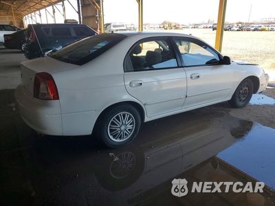 Trzecie zdjęcie samochodu z tyłu: 2003 KIA SPECTRA GS VIN:KNAFB161X35106941 - miniatura