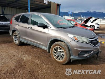 Czwarte zdjęcie samochodu z boku: 2016 HONDA CR-V SE VIN:5J6RM4H47GL092026 - miniatura