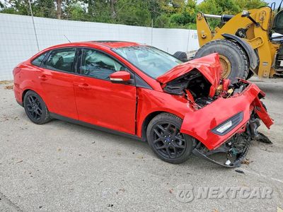 Czwarte zdjęcie samochodu z boku: 2016 FORD FOCUS SE VIN:1FADP3F24GL329953 - miniatura