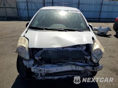 Piąte zdjęcie samochodu w środku: 2011 TOYOTA YARIS BASE VIN:JTDKT4K38B5331686 - miniatura